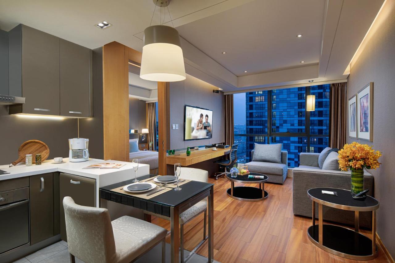 Ascott Raffles City Beijing Bagian luar foto
